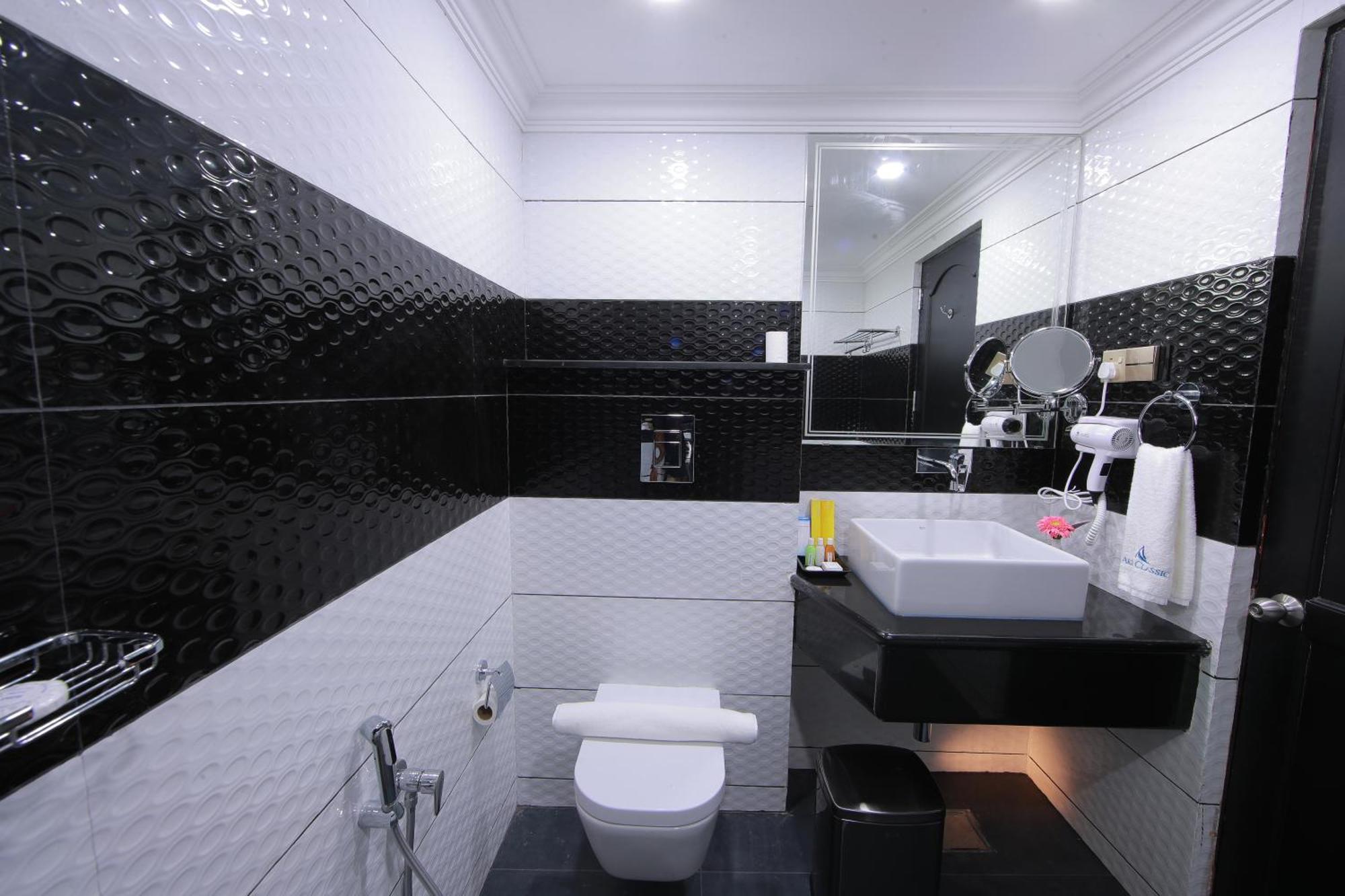 Akhil Classic Thiruvananthapuram Zimmer foto